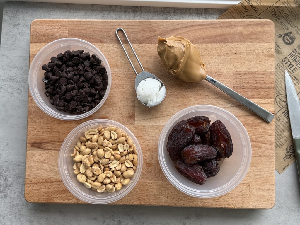 peanut butter stuffed dates recipes ingredients: medjool dates, dark chocolate, coconut oil, peanuts, peanut butter