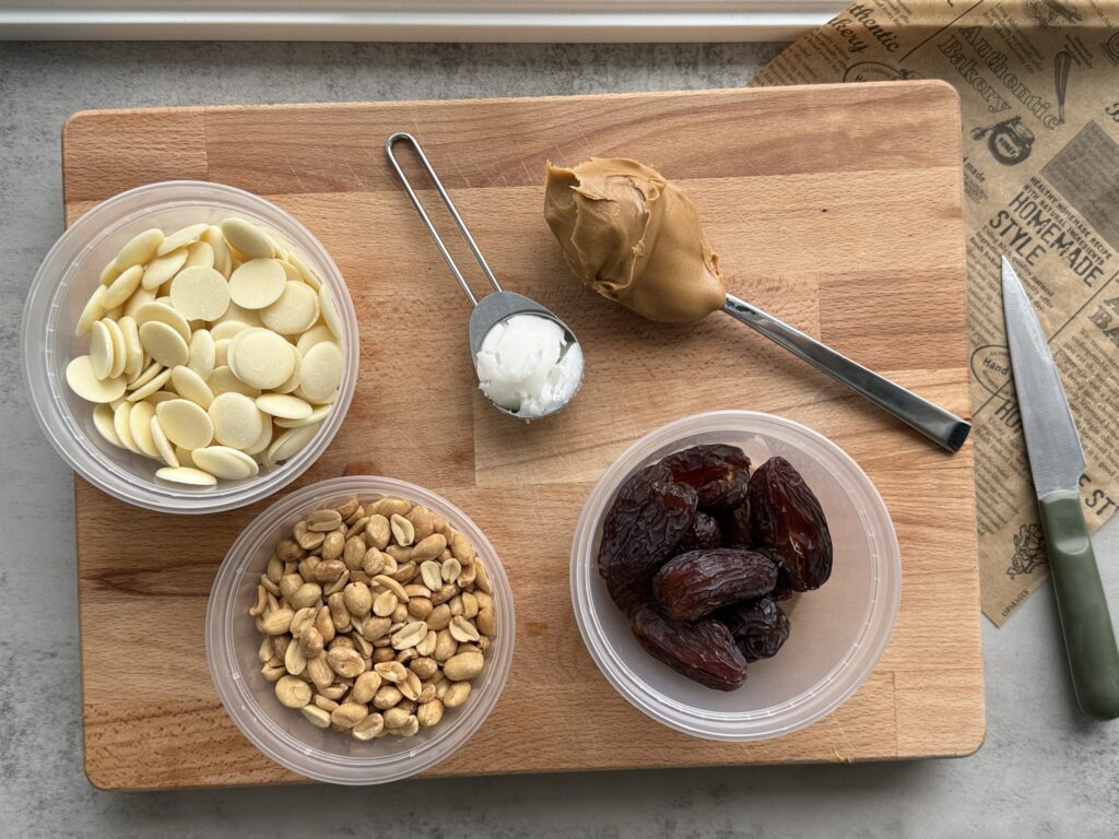 peanut butter desserts - white chocolate peanut butter dates ingredients: white chocolate, coconut oil, peanut butter, peanuts, medjool dates