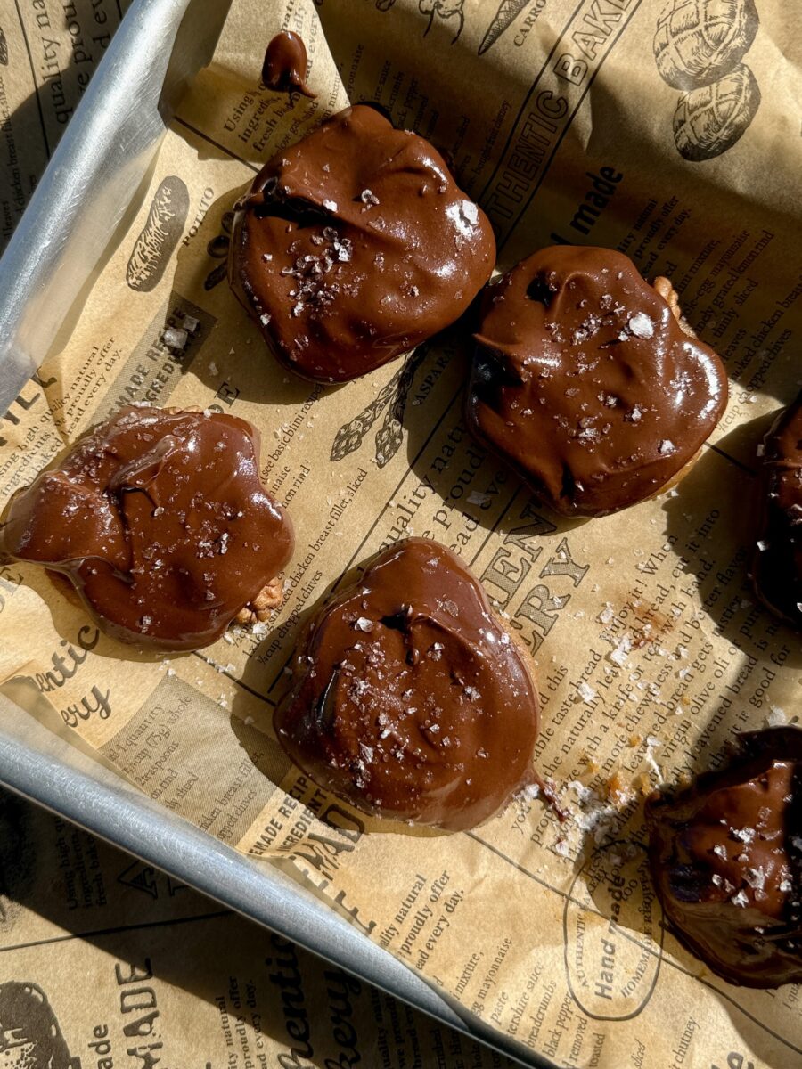 The Ultimate Clean Chocolate Turtle Recipe : chocolate turtles sitting on parchment paper