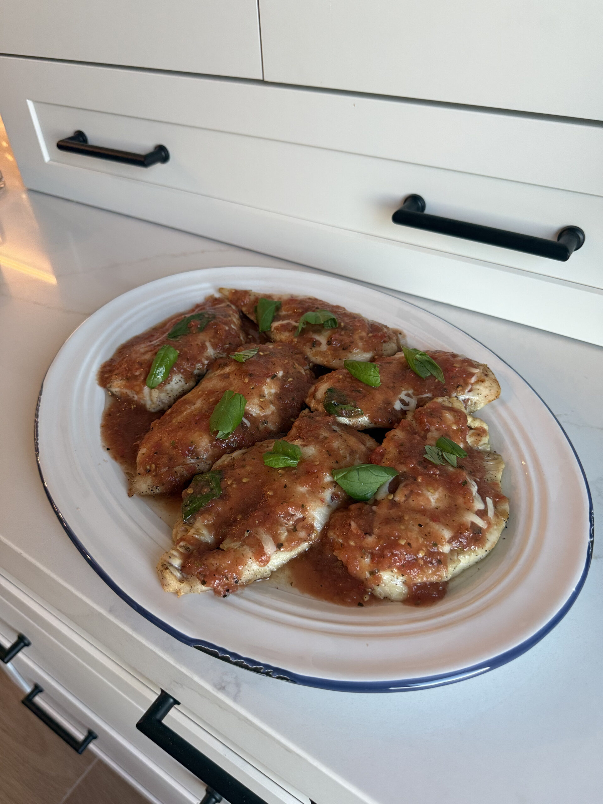 healthier chicken parmesan with grate heirloom tomato sauce