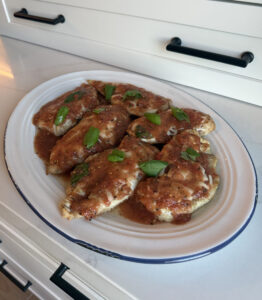 healthier chicken parmesan with grate heirloom tomato sauce
